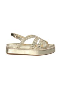 Gold sandal with braided straps and an adjustable ankle buckle. Features a thick platform sole and smooth metallic finish.