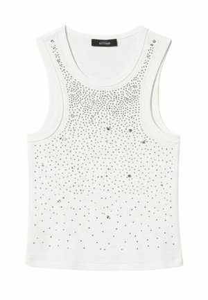 Canotta bianca senza maniche con scollo rotondo, decorata con piccoli borchie e paillettes argentate sparse sulla parte anteriore.
