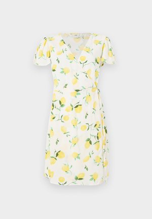 Hvit omslagskjole med korte pufferm, med sitronmønster med gule frukter og grønne blader. Lett stoff med en myk tekstur.