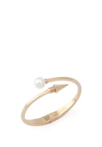 Bracelet jonc réglable en ton or, doté d'une perle et d'un accent pointu, avec une finition lisse et des détails en spirale près de la pointe.