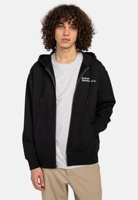 Black zip-up hoodie with a kangaroo pocket, drawstring hood, and embroidered "Element Skateboard Co." logo in teal on the left chest.