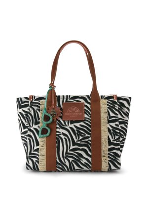 Blazoenprint draagtas met bruine handvatten en afwerking, beige franjes als accenten, en een groene zonnebrillenhanger bevestigd aan een van de handvatten.