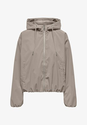 Beežika kapuutsiga tuulekindel jope esiluku, paelaga kapuutsi, elastsete mansettide, elastse ääre ja küljetaskutega.