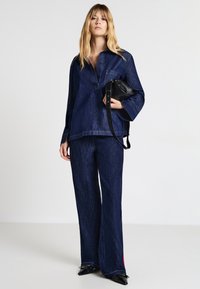Calliope Poloshirt - blu denim scuro