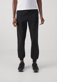 Casall COMFORT PANTS - Treniņtērpa apakšdaļas - black