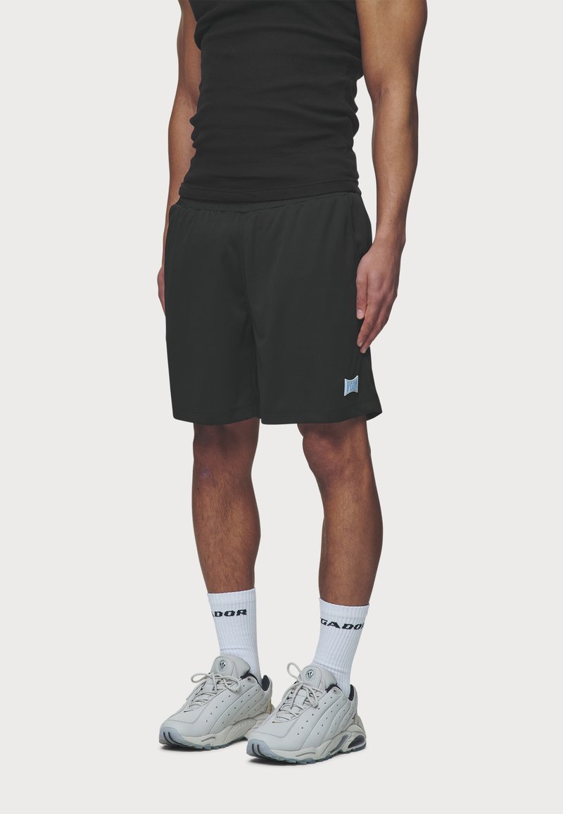 Pegador - SUTRO - Tracksuit bottoms - black, Enlarge