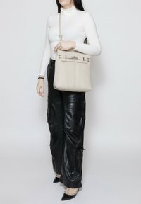 Roberta Rossi CONVERTIBLE INTO - Rugzak - beige