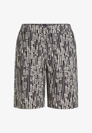 Pantalones cortos en blanco y negro con un patrón de texto repetido. Hechos de tela con textura suave. Cintura estándar con cierre de botón.