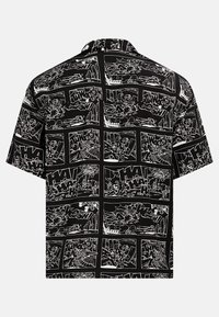 Short-sleeve shirt in black fabric featuring a comic strip pattern in white, with various illustrated scenes and onomatopoeic text accents.
