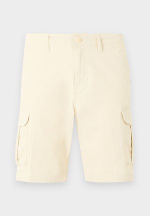 Bež kratke hlače do kolen z gumbi in zadrgo, z zankami za pas ter z žepki na obeh straneh s poklopcem.