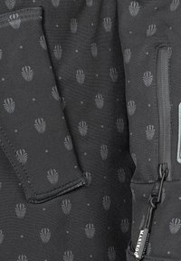 Black fabric with a subtle pattern of light gray motifs. Features a zipper on the right and reinforced stitching on the edges.
