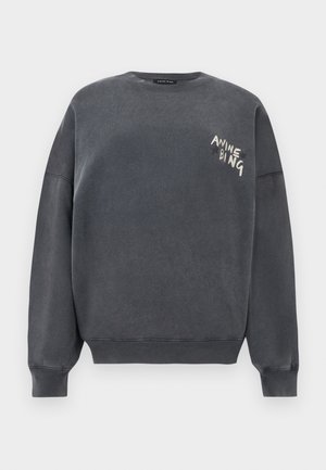 Γκρι σκουρόχρωμο φούτερ με στρογγυλή λαιμόκοψη και μακριά μανίκια, με ριμπ μανσέτες και τελείωμα, με λευκή επιγραφή "ANINE BING" στο αριστερό μέρος του στήθους.