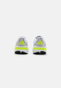 Grey and blue athletic shoes with lime green accents, featuring a mesh upper, cushioned sole, and black rubber outsole.
