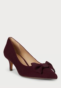 Burgundy suede pump with a pointed toe, small heel, and a ribbed bow accent on the upper. Smooth inner lining.