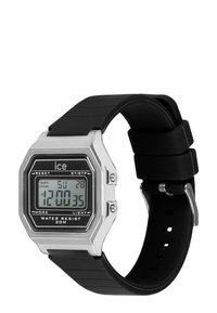 Reloj digital con una caja rectangular de acero plateado, esfera negra, correa de goma negra y resistente al agua hasta 30 m. Cuenta con múltiples botones.