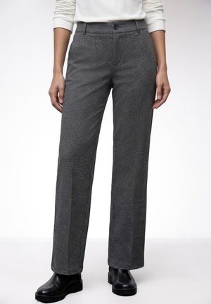 - Spodnie materiałowe