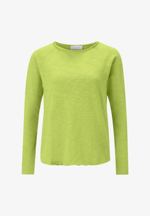 Top de manga larga en verde lima brillante, hecho de una tela suave y texturizada con escote redondo y dobladillo ligeramente curvado.