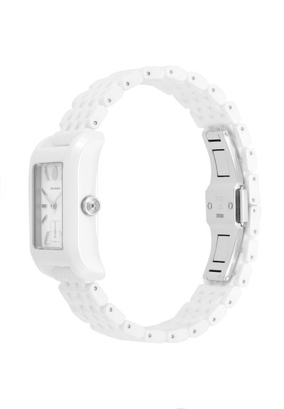 Montre-bracelet rectangulaire blanche avec bracelet en silicone texturé et fermoir argenté, affichant l'heure analogique avec un cadran minimaliste et un petit sous-cadran des secondes.