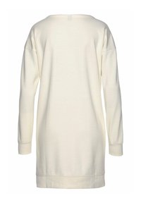 Langärmliges, cremefarbenes Oversized-Oberteil mit weitem Halsausschnitt, lockerer Passform und gerippten Bündchen und Saum. Weicher Stoff mit minimalen Nähten.