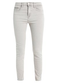 Grå denim skinny jeans med fem fickor, knappstängning framtill och lätt blekning. Slät textur med en skräddarsydd passform.