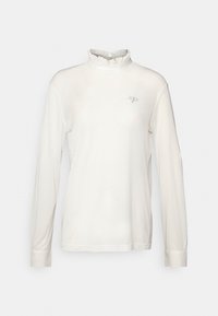 Långärmad vit topp med en hög volangkrage och en liten grå logotyp på bröstet. Slät, lättviktsmaterial med åtsittande ärmar.