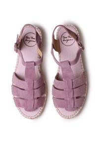Purple suede sandals with a woven design, adjustable buckle closure, and beige braided jute sole. Soft inner lining visible.