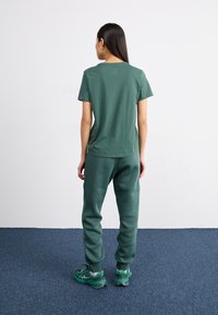 Nike Sportswear PANT - Treningo apatinė dalis - vintage green/sail