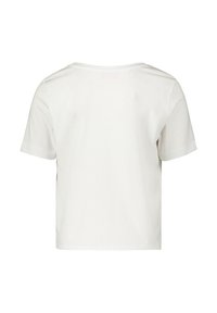 T-shirt en coton blanc avec un col rond et des manches courtes. Le design est simple, avec une coupe droite et des détails de couture minimaux.