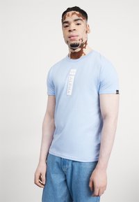 Alpha Industries PP T - Potiskana majica - light blue