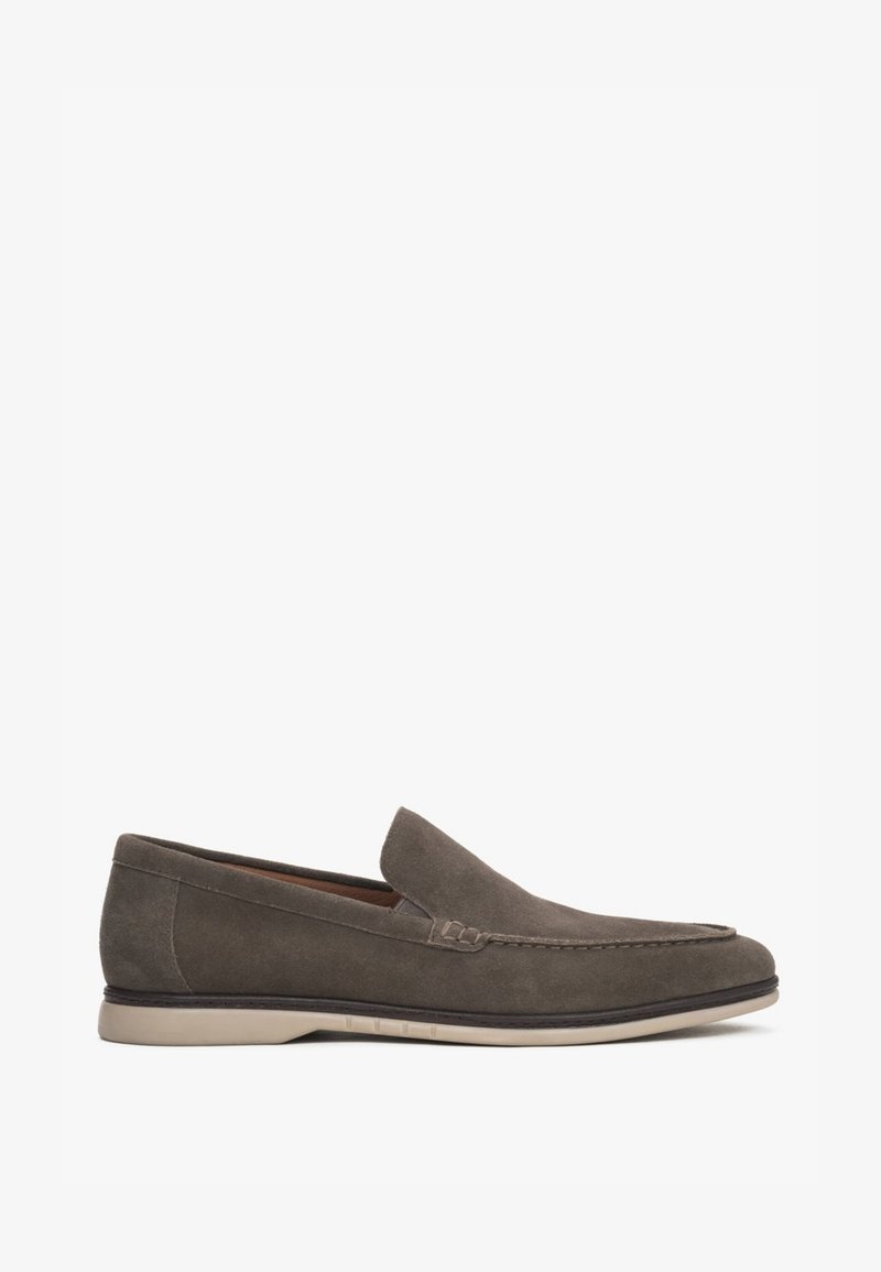 Brown suede slip-on loafer with stitching details and light beige rubber sole, shown from side view on white background.