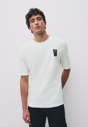 Next, REGULAR FIT - RELAXED FIT GUINNESS LICENCE T-SHIRT . - T-Shirt print - white