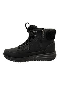 Botte noire à la cheville en matériau synthétique, avec un col en tissu texturé, un laçage à l'avant, une fermeture éclair sur le côté et une semelle en caoutchouc épaisse.