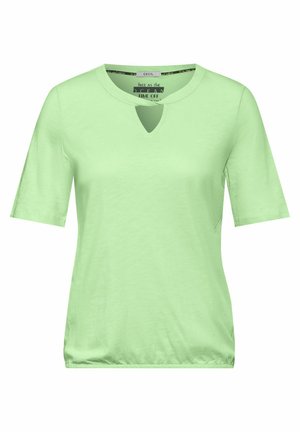 Myntegrønn kortermet T-skjorte med rund hals og nøkkelhullsdetalj ved brystet. Laget av myk, glatt stoff med avslappet passform.