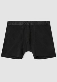 Boxers noirs en tissu doux. Dotés d'une ceinture élastique texturée avec logo. Le design classique comprend une poche profilée et des coutures surpiquées.