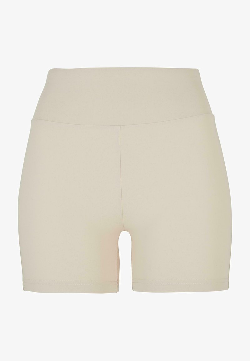 Beige high-waisted shorts van een soepele, rekbare stof. Kenmerken zijn een strakke pasvorm en een lengte tot halverwege de dijen, zonder zichtbare naden of patronen.