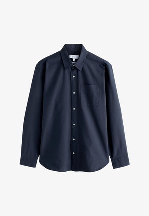 Navyblauw, langemouws overhemd met knopen, gemaakt van zacht katoen met een klassieke kraag, borstzak en witte knopen.