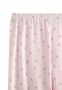 Ljust rosa pyjamasbyxor med en mjuk, texturerad yta; har små, utspridda rosa rosetter och en elastisk midja för komfort.