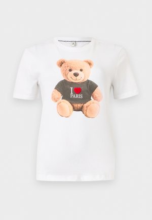 Valge lühikeste varrukatega särk, mille esiküljel on naeratava kaisukaruga trükitud musta "I love Paris" särgiga pilt.