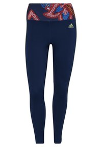 Granatowe legginsy z wielokolorowym wzorzystym pasem, posiadające elastyczny pasek i małe, żółte logo Adidas z boku.