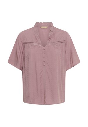 Blusa rosa a maniche corte con colletto arricciato, chiusura a bottoni frontale e motivo a pois testurizzato. Presenta una striscia orizzontale di dettaglio metallico.