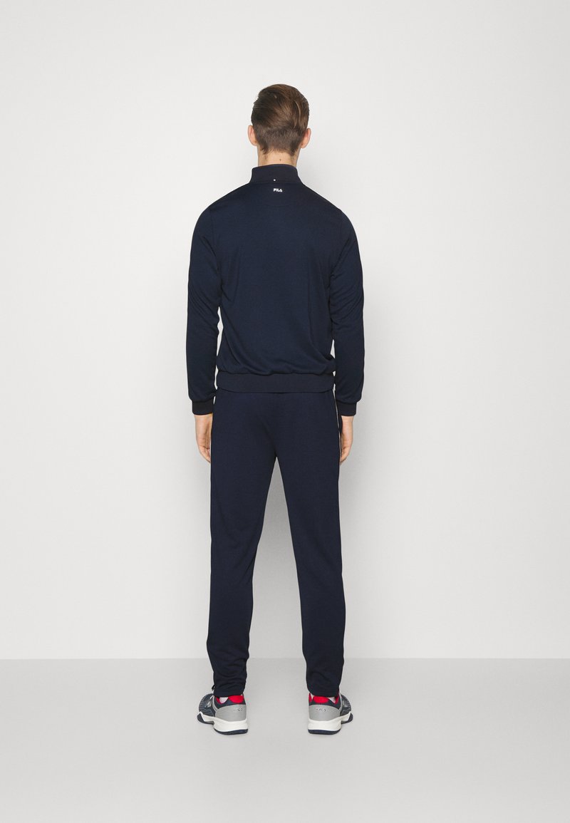 Fila TRACKSUIT JAKE SET Tracksuit peacoat blue/dark blue Zalando.de