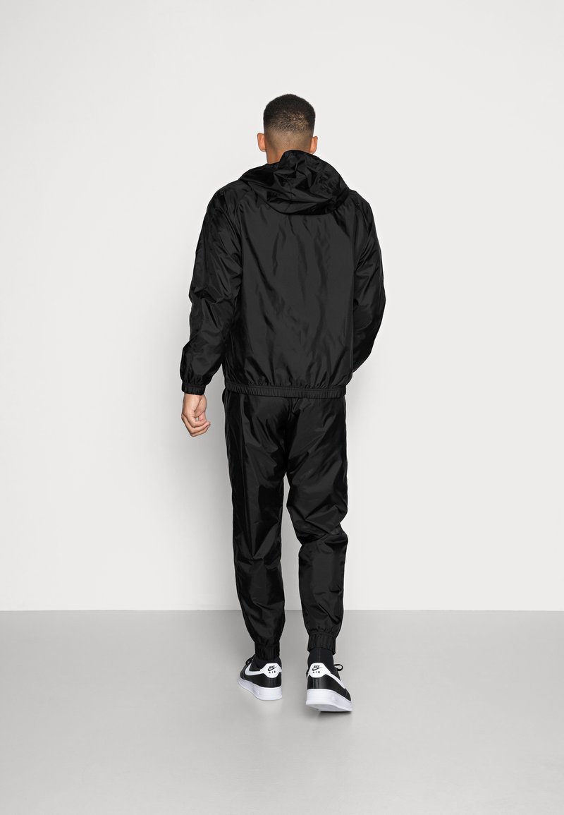 Nike Sportswear Tracksuit Black Zalando Co Uk Nike Sportswear Tracksuit Black Zalando Co Uk