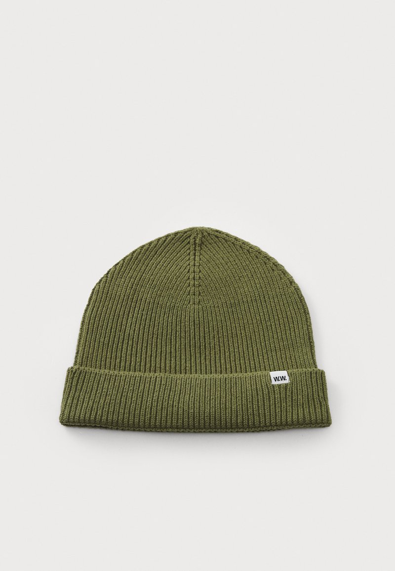 Olive green knit beanie with a fold-over cuff, featuring ribbed texture and a small white label displaying "W.W." on the side.