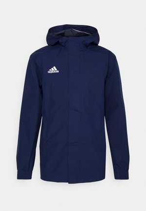 Veste à capuche Adidas bleu marine avec manches longues, poches avant et poignets élastiques, vue de face sur fond neutre.