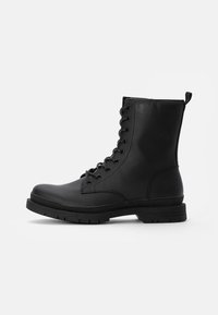 UNISEX - Classic ankle boots - black