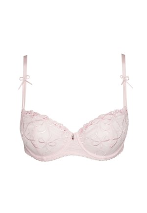 Reggiseno rosa chiaro con ferretto, caratterizzato da motivi floreali ricamati, spalline di raso con fiocchi e un piccolo accento decorativo al centro.