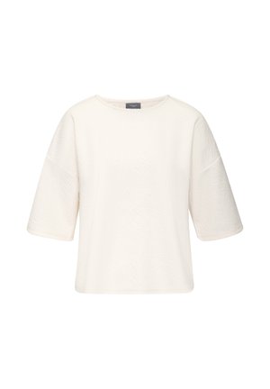 White short-sleeve textured knit top with a crew neckline and a loose, boxy fit.