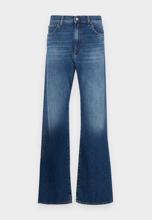 Denim-bootcut-Jeans in mittlerem Blau mit einem verblassten Effekt. Verfügt über fünf Taschen, einen Knopfverschluss und gestickte Akzente. Klassisches Design.