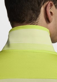 Nike Performance Polo - life lime cyber black