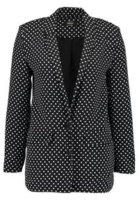 Czarna marynarka w białe kropki, dopasowana, zapinana na pojedynczy guzik, z klapami z wycięciem oraz dwoma przednimi kieszeniami.